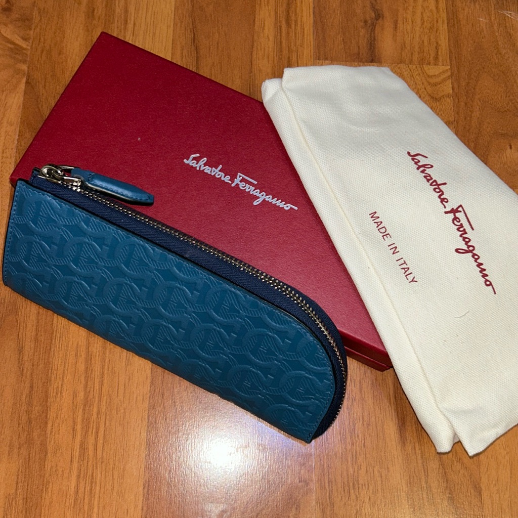 Authentic Salvatore Ferragamo Embossed Gancini Leather Pouch